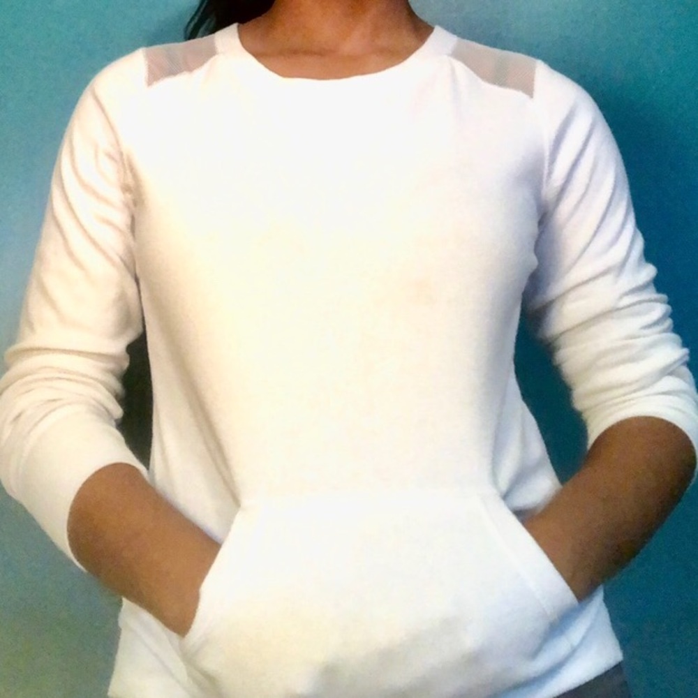 white hoodless sweatshirt with pockets